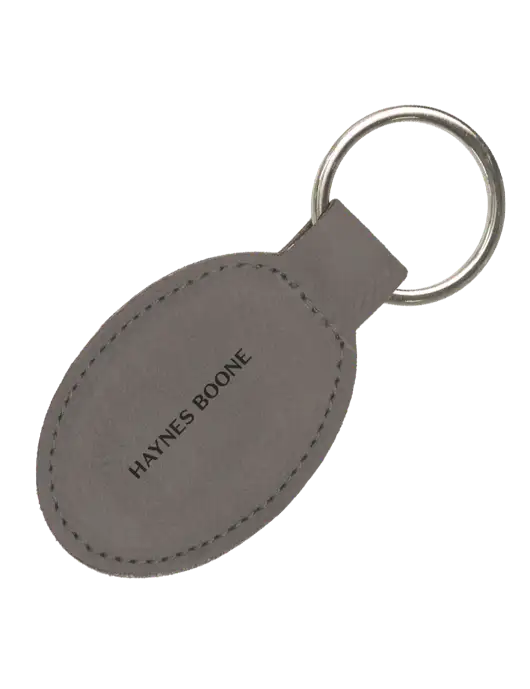 Grey Leatherette Oval Keychain w/Haynes & Boone Logo